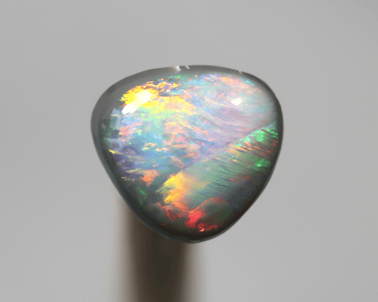 0.71 ct dark opal