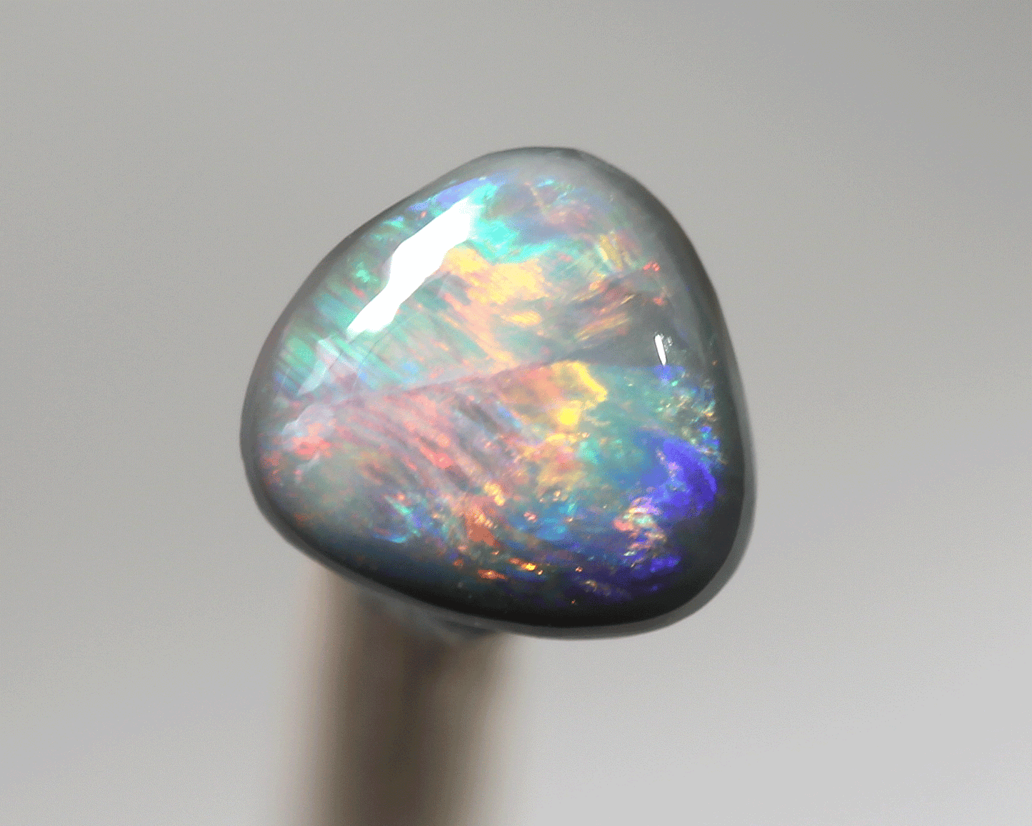 0.71 ct dark opal